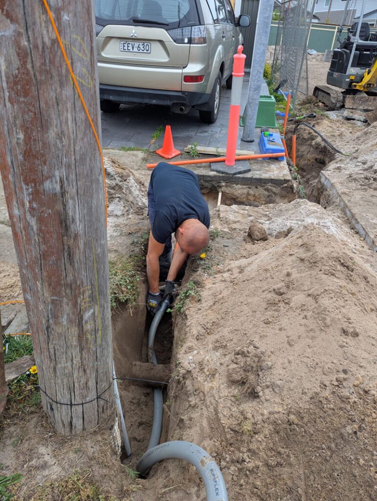 Electrical workers carrying out high-voltage infrastructure work